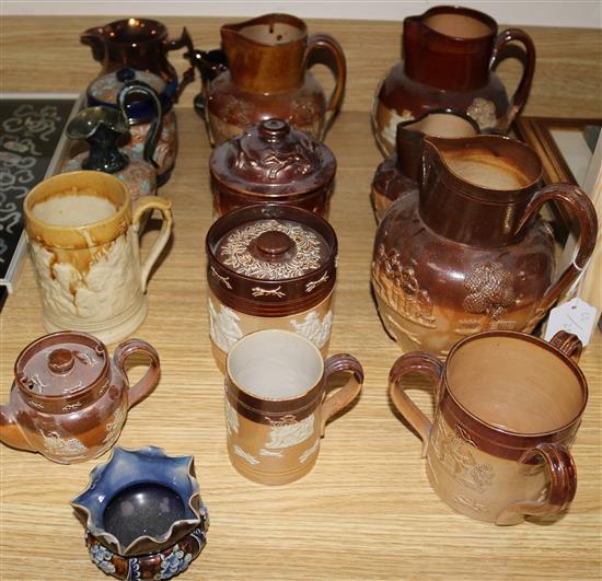 A collection of Doulton stoneware jugs, etc.
